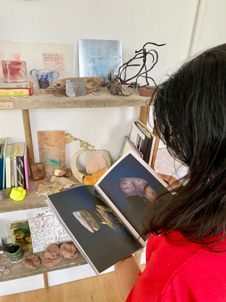 Person handling objects in an archive